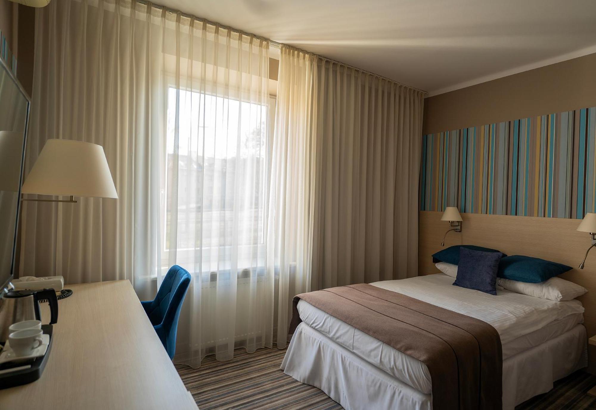 Standard queen room access to the wellness fitness area