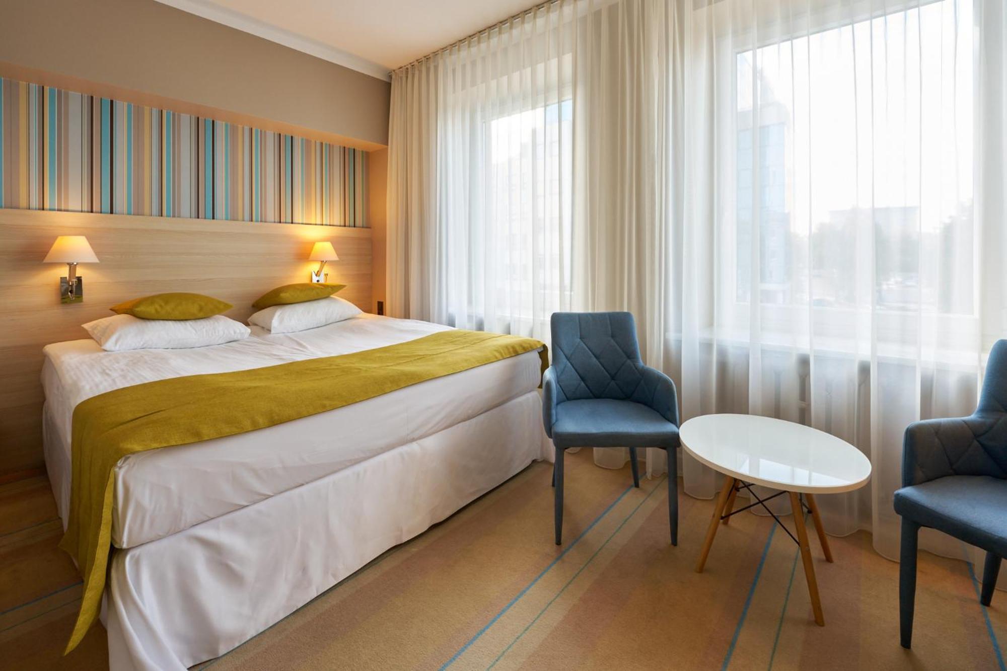 Standard queen room access to the wellness fitness area