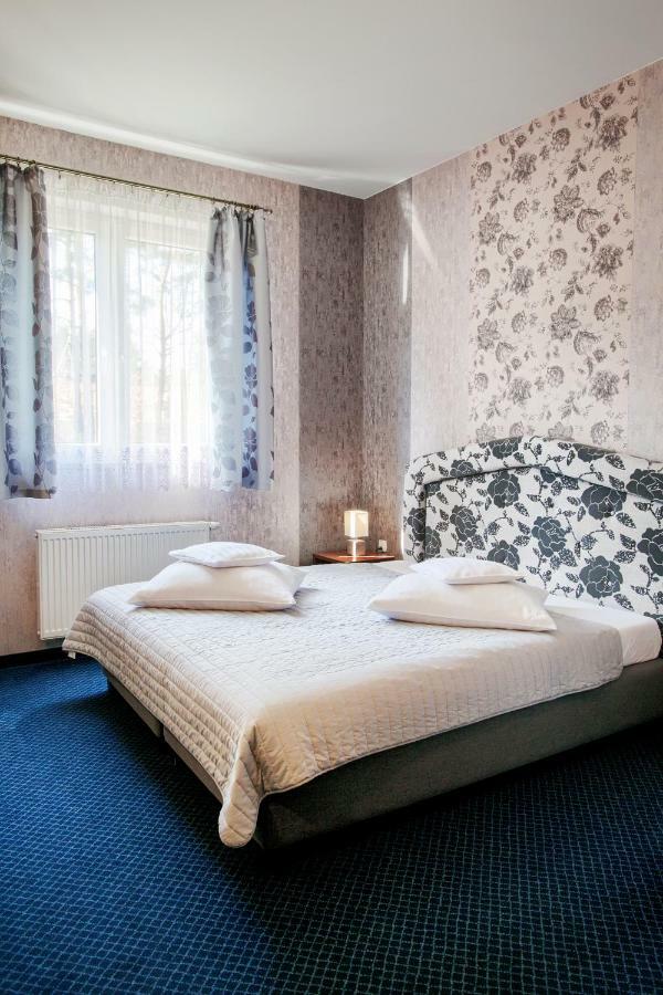 Doppel- oder Zweibettzimmer