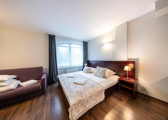 Pokoje i apartamenty ,,Leśne