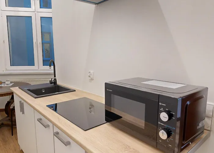 roomspoznan pl - Apartamenty i Pokoje Półwiejska 20 - 24h self check-in